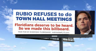 Billboard calling on Rubio to hold town meetings