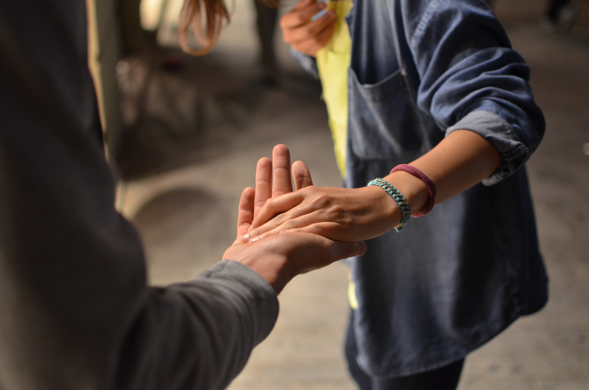 person telling their friend about ways to give back